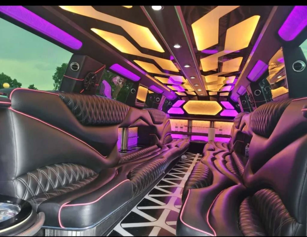 Berthoud white Cadillac Escalade stretch limo